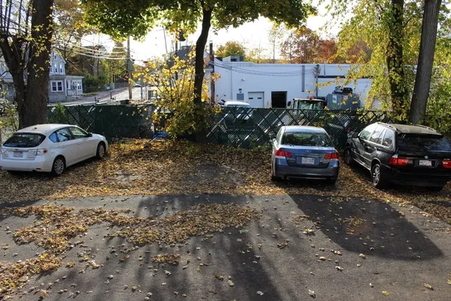a car parked in front of a house