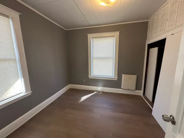 an empty room with windows