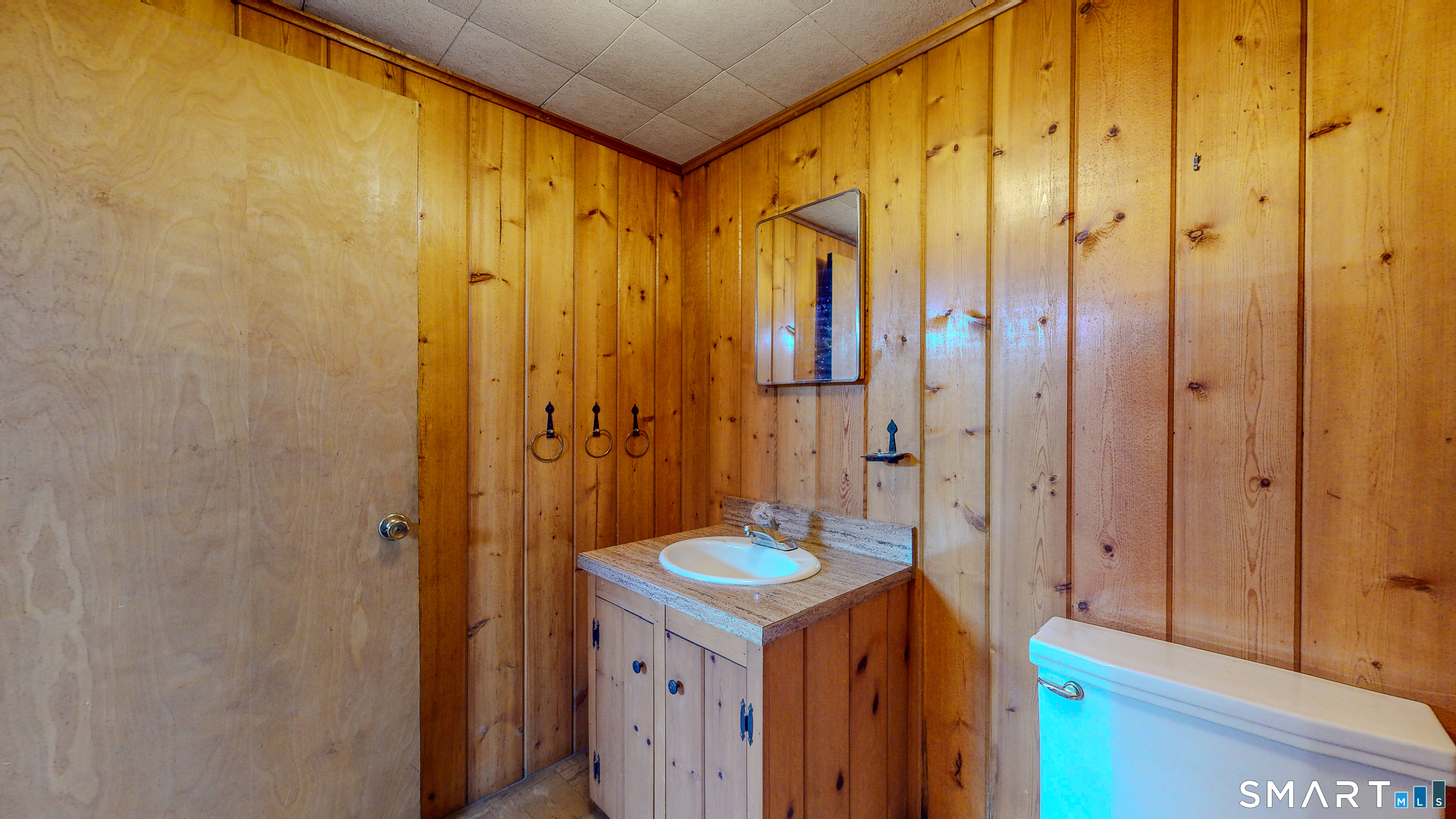 133 Chambers Road Danbury, CT 06811 - Photo 25 of 30 a bathroom with a sink a mirror and a shower
