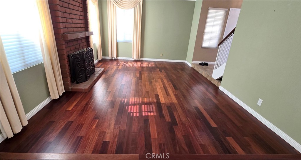 1400 Post Fullerton, CA 92833 - Photo 20 of 70 a view of empty room with wooden floor and fireplace