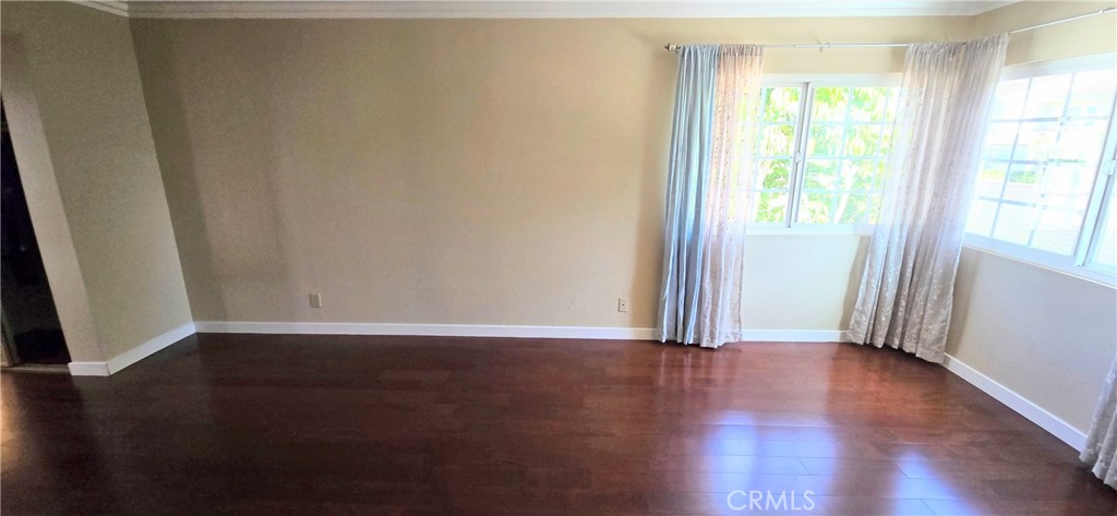 1400 Post Fullerton, CA 92833 - Photo 34 of 70 an empty room with wooden floor and windows