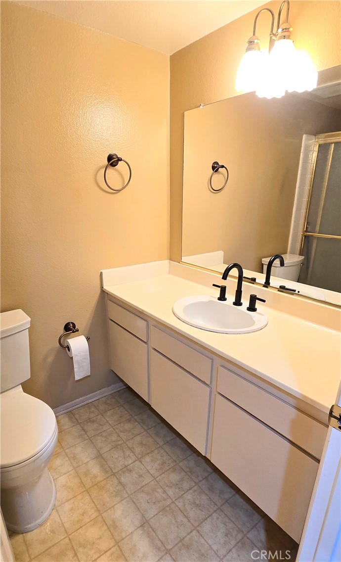 1400 Post Fullerton, CA 92833 - Photo 37 of 70 a bathroom with a sink and a mirror