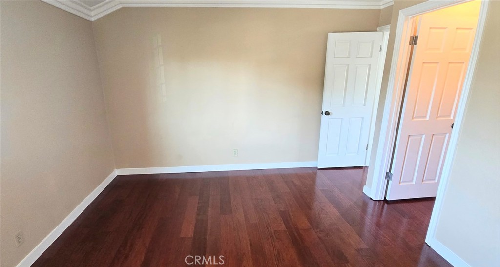 1400 Post Fullerton, CA 92833 - Photo 44 of 70 an empty room with wooden floor and window