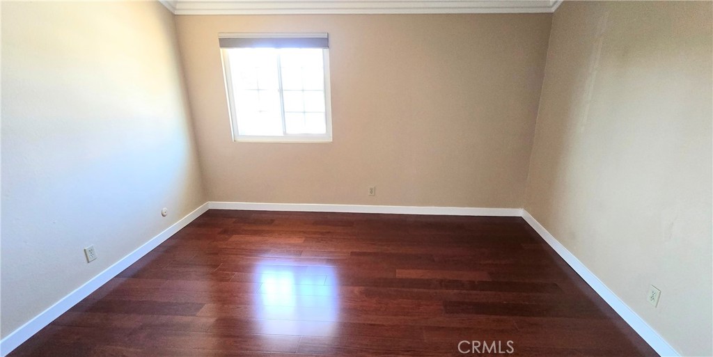 1400 Post Fullerton, CA 92833 - Photo 45 of 70 an empty room with wooden floor and windows