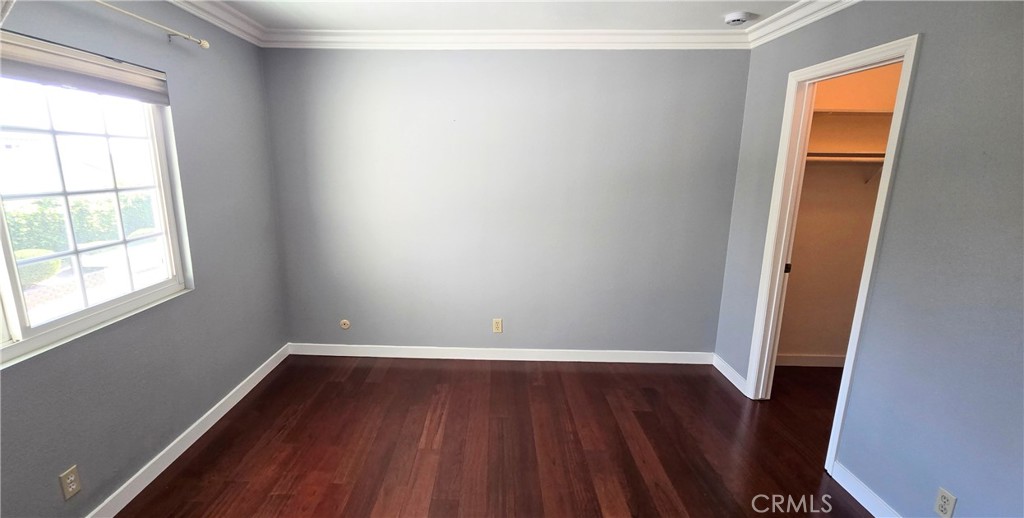 1400 Post Fullerton, CA 92833 - Photo 49 of 70 an empty room with wooden floor and windows