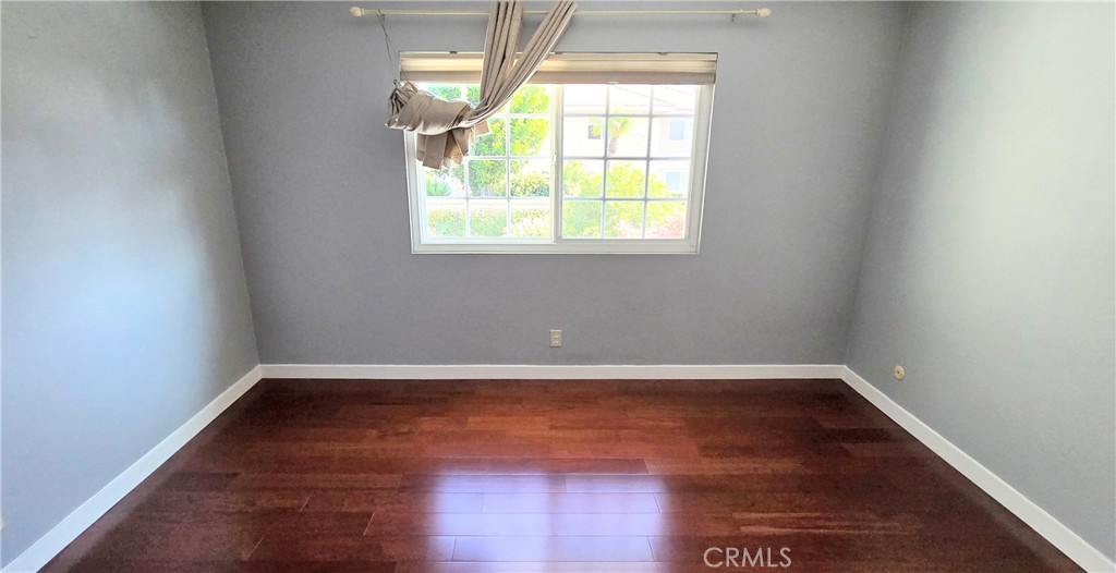 1400 Post Fullerton, CA 92833 - Photo 50 of 70 an empty room with wooden floor and windows