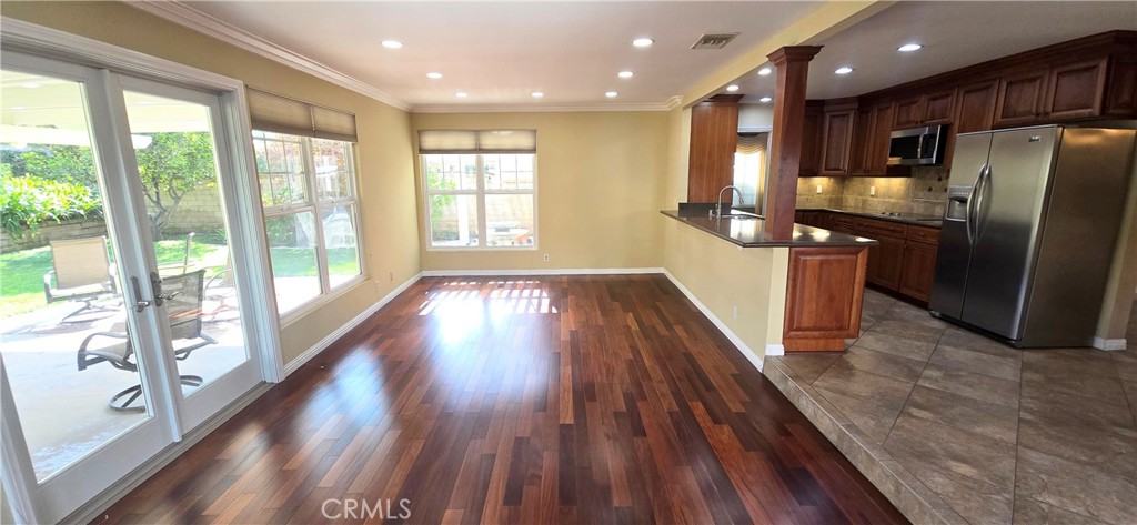 1400 Post Fullerton, CA 92833 - Photo 8 of 70 a view of kitchen with cabinets and wooden floor