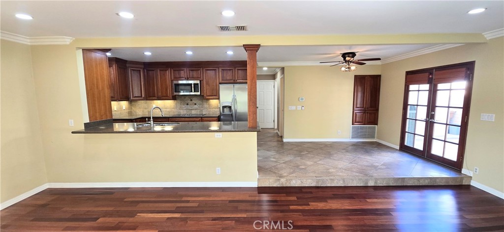 1400 Post Fullerton, CA 92833 - Photo 9 of 70 a view of kitchen and hall with wooden floor