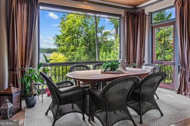a spacious bathroom with a granite countertop tub sink and mirror