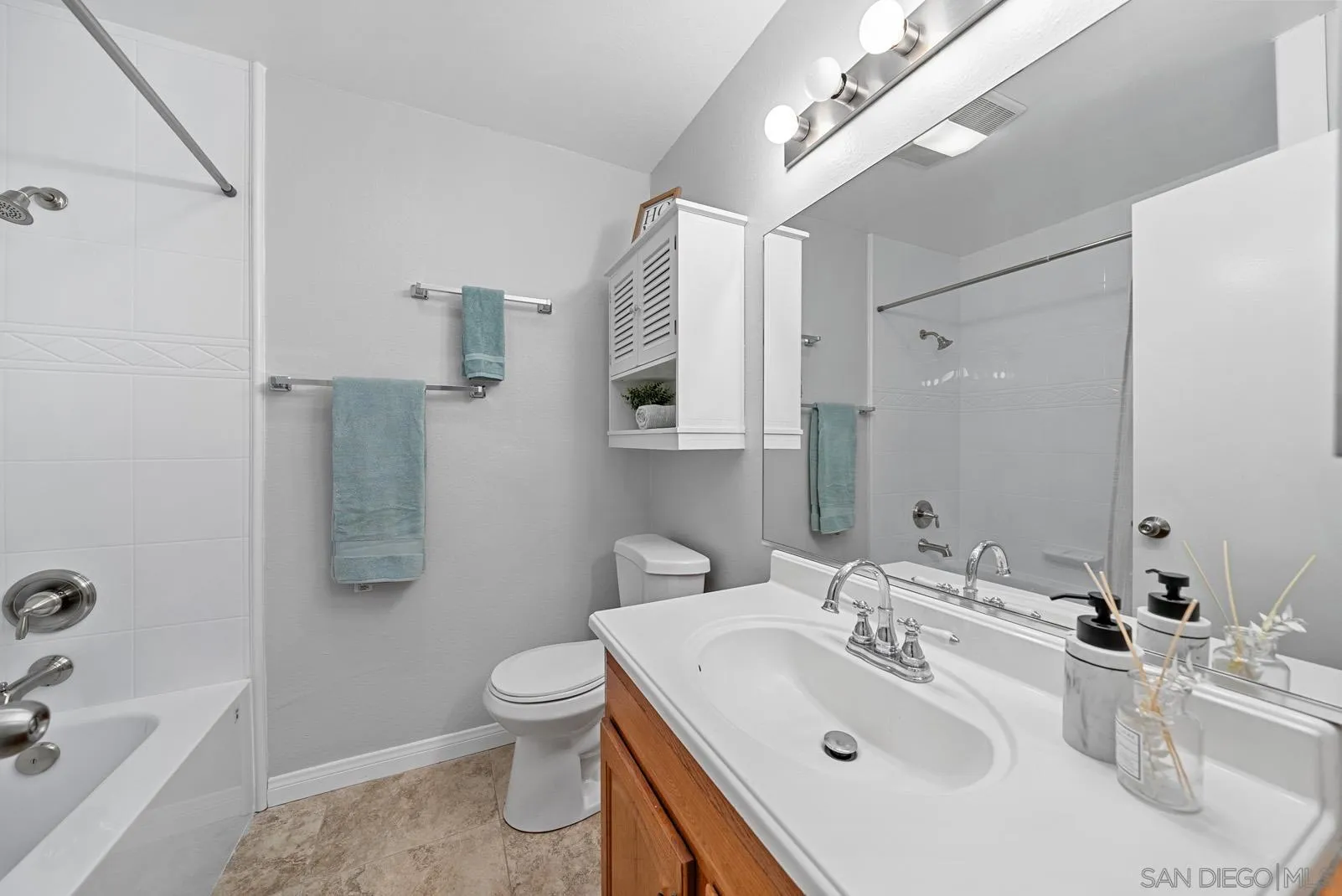 950 East Fallbrook Street Fallbrook, CA 92028 - Photo 16 of 37 a bathroom with a sink toilet and shower