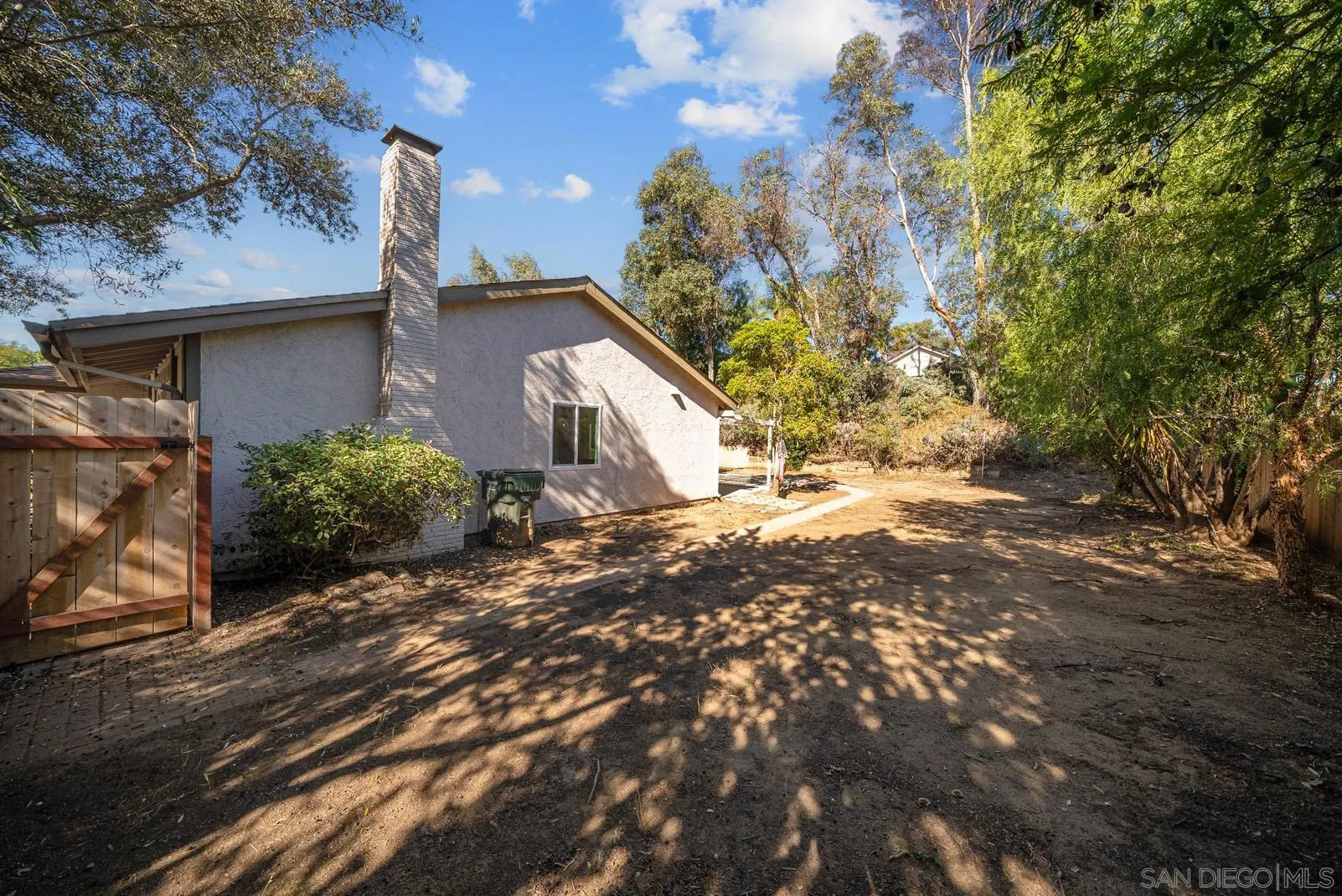 950 East Fallbrook Street Fallbrook, CA 92028 - Photo 30 of 37 a view of a house with a tree