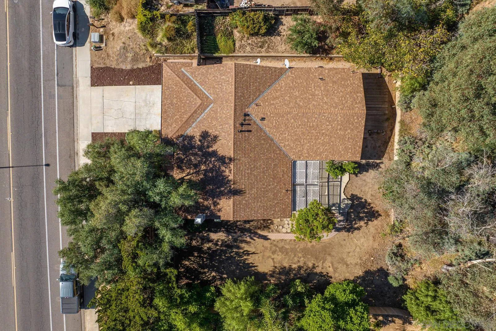 950 East Fallbrook Street Fallbrook, CA 92028 - Photo 34 of 37 an aerial view of a house with outdoor space and trees all around