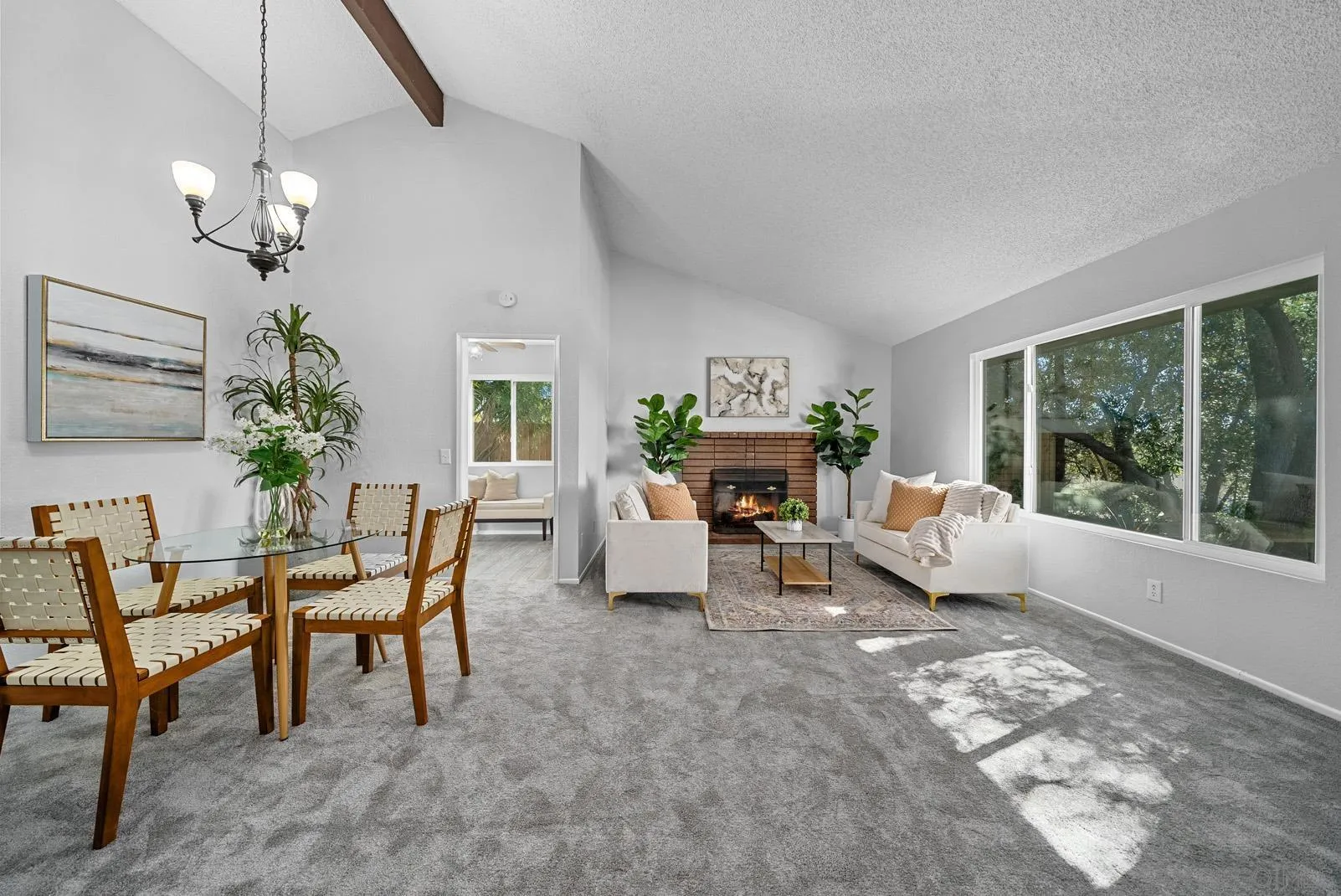950 East Fallbrook Street Fallbrook, CA 92028 - Photo 6 of 37 a living room with furniture a chandelier and a fireplace