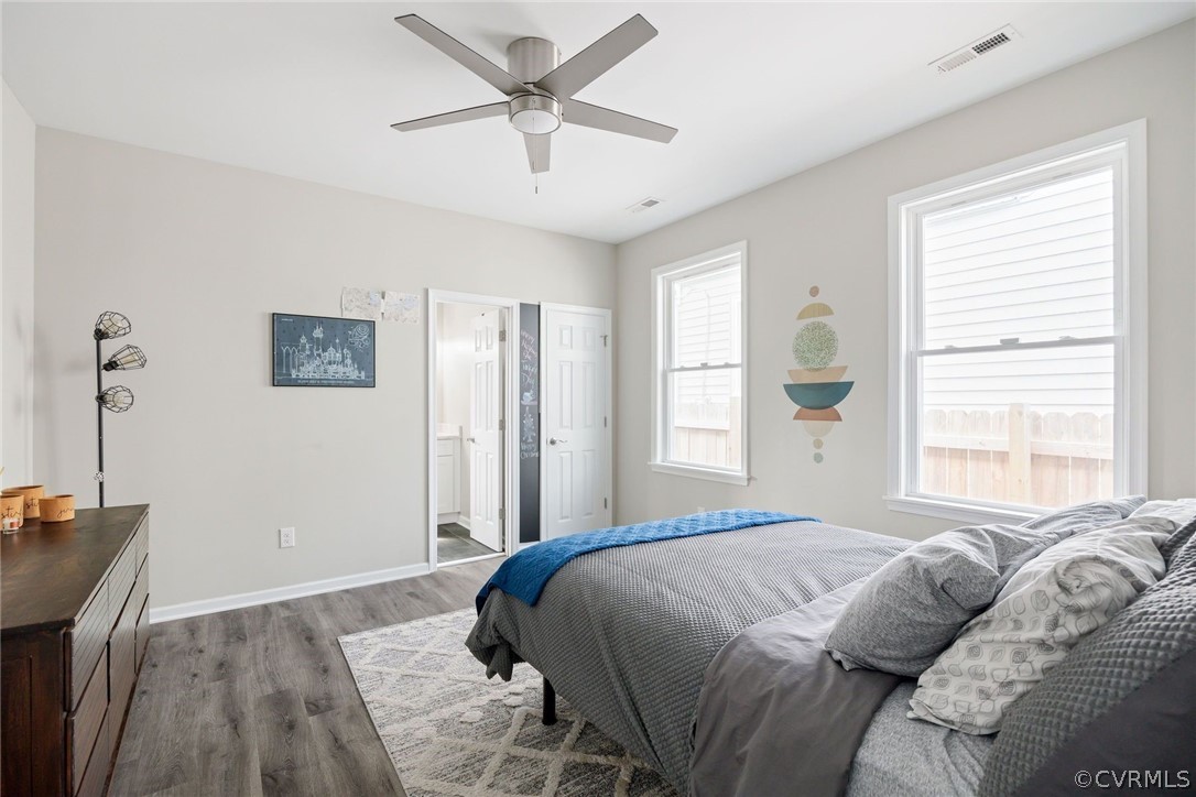 2900 Decatur Street Richmond, VA 23224 - Photo 19 of 35 a bedroom with a large bed and a window