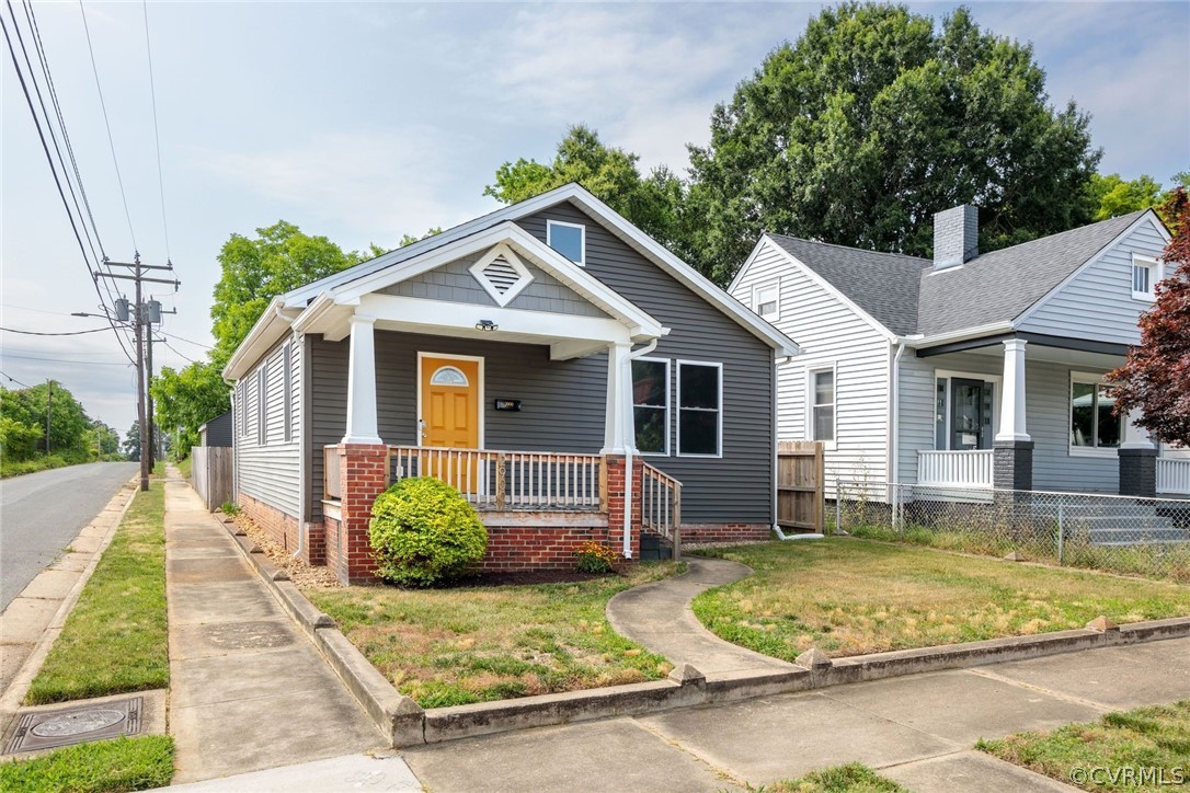 2900 Decatur Street Richmond, VA 23224 - Photo 2 of 35 a view of a house with backyard porch and furniture