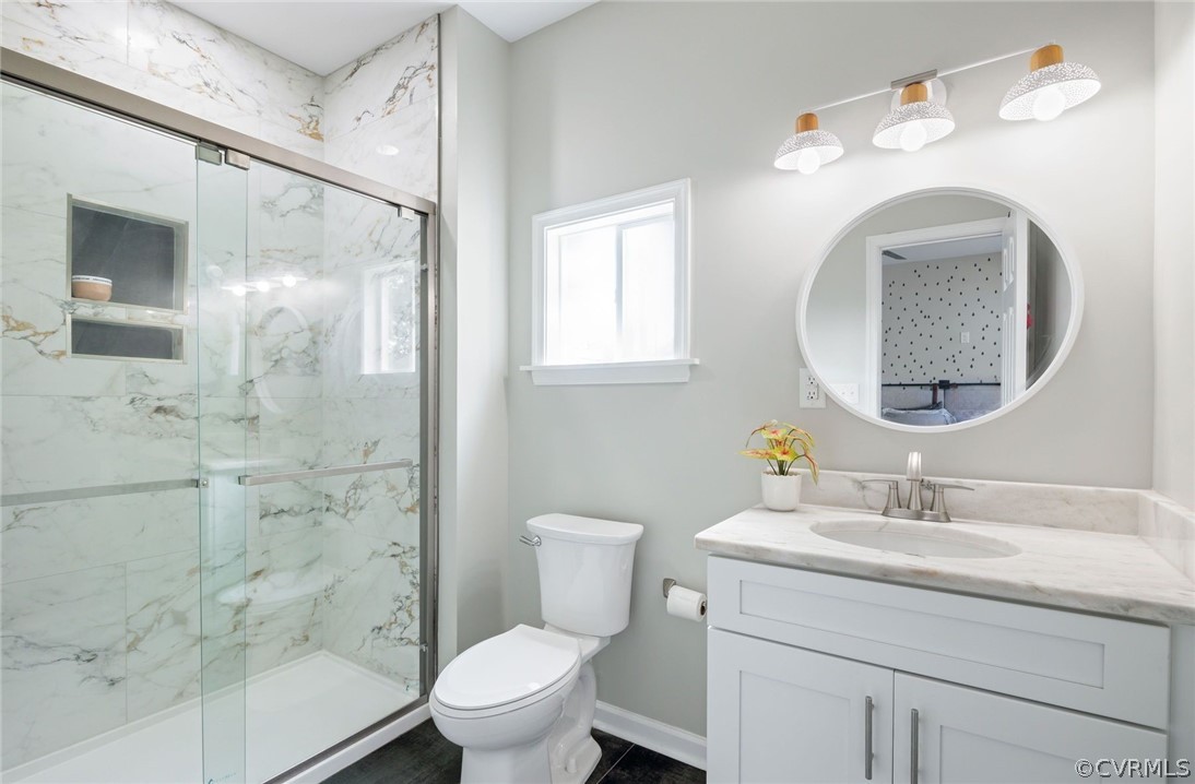 2900 Decatur Street Richmond, VA 23224 - Photo 22 of 35 a bathroom with a sink toilet and shower