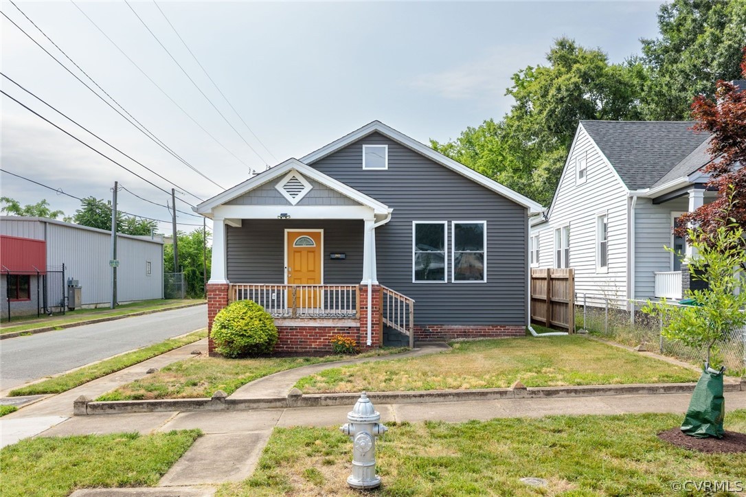2900 Decatur Street Richmond, VA 23224 - Photo 3 of 35 a front view of a house with garden