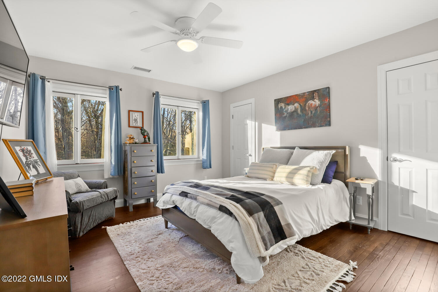 442 Riversville Road Greenwich, CT 06831 - Photo 16 of 29 a bedroom with a bed couch and a window