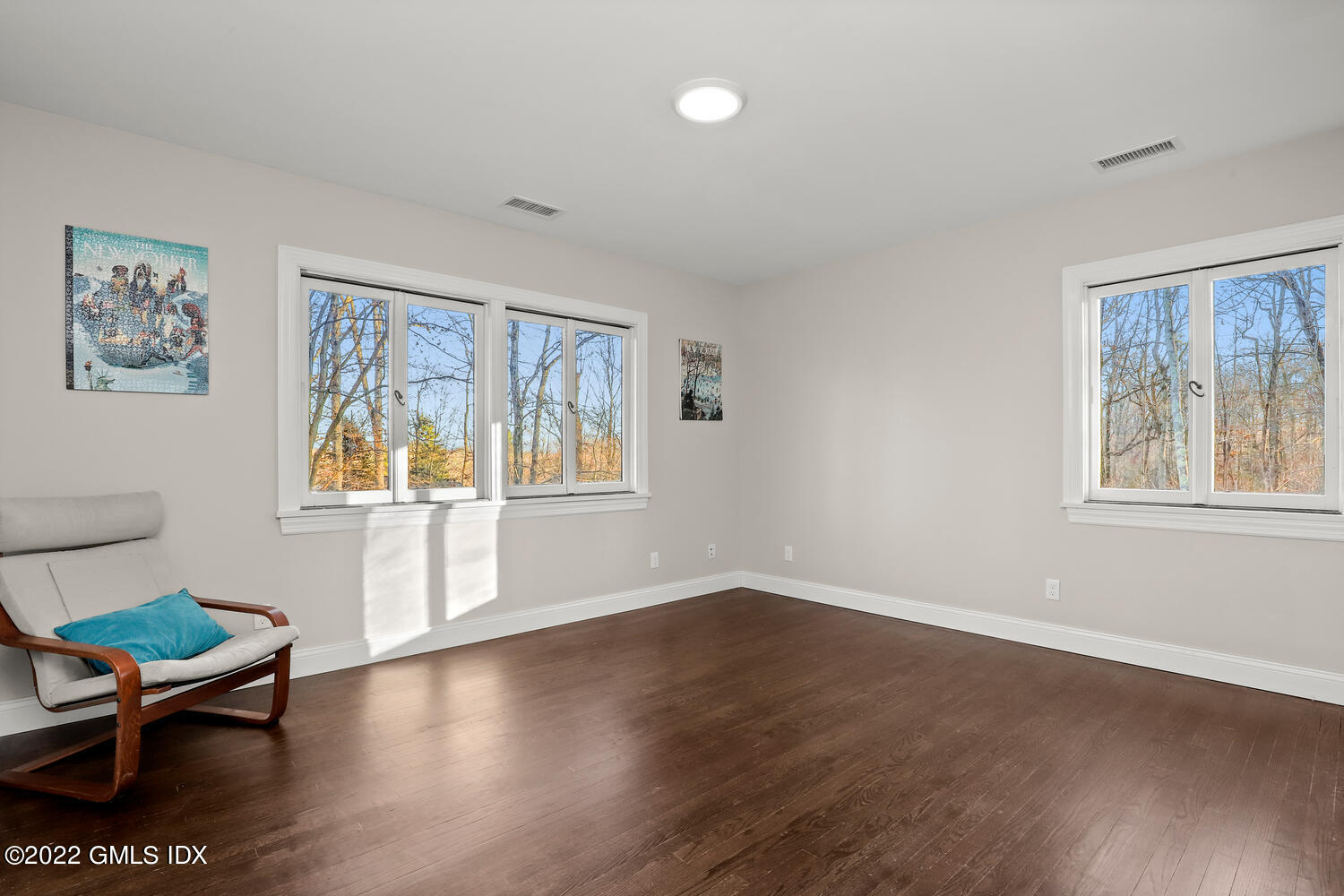 442 Riversville Road Greenwich, CT 06831 - Photo 18 of 29 a view of a livingroom with furniture a ceiling fan and wooden floor