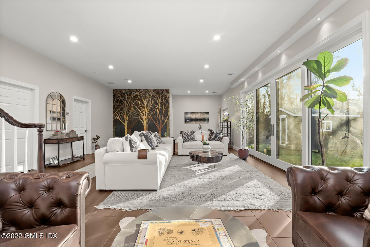 442 Riversville Road Greenwich, CT 06831 - Photo 20 of 29 a living room with furniture and a large window