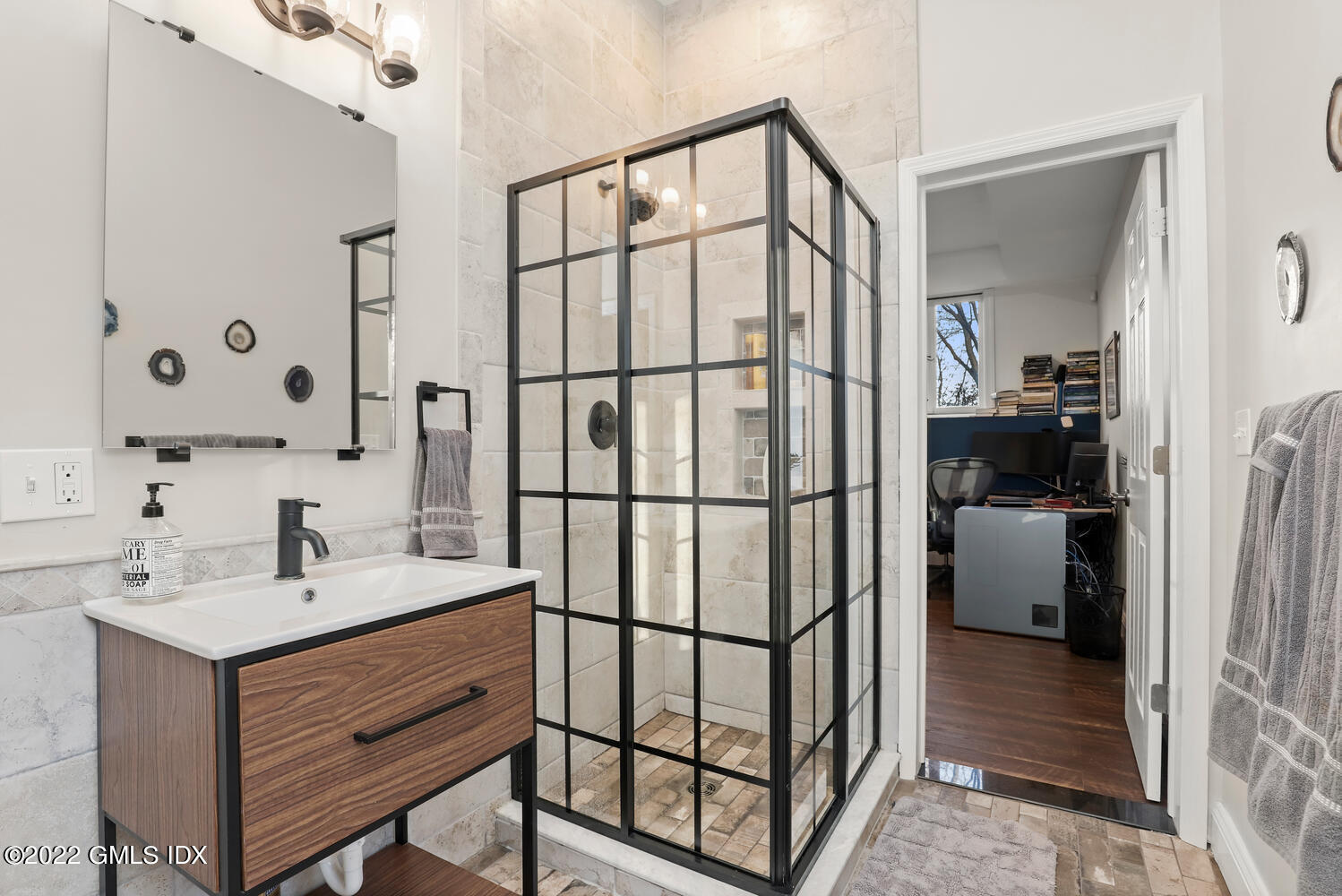 442 Riversville Road Greenwich, CT 06831 - Photo 24 of 29 a bathroom with a sink and a mirror