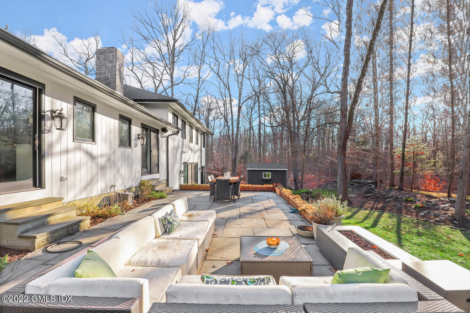 442 Riversville Road Greenwich, CT 06831 - Photo 25 of 29 a view of a house with backyard and sitting area