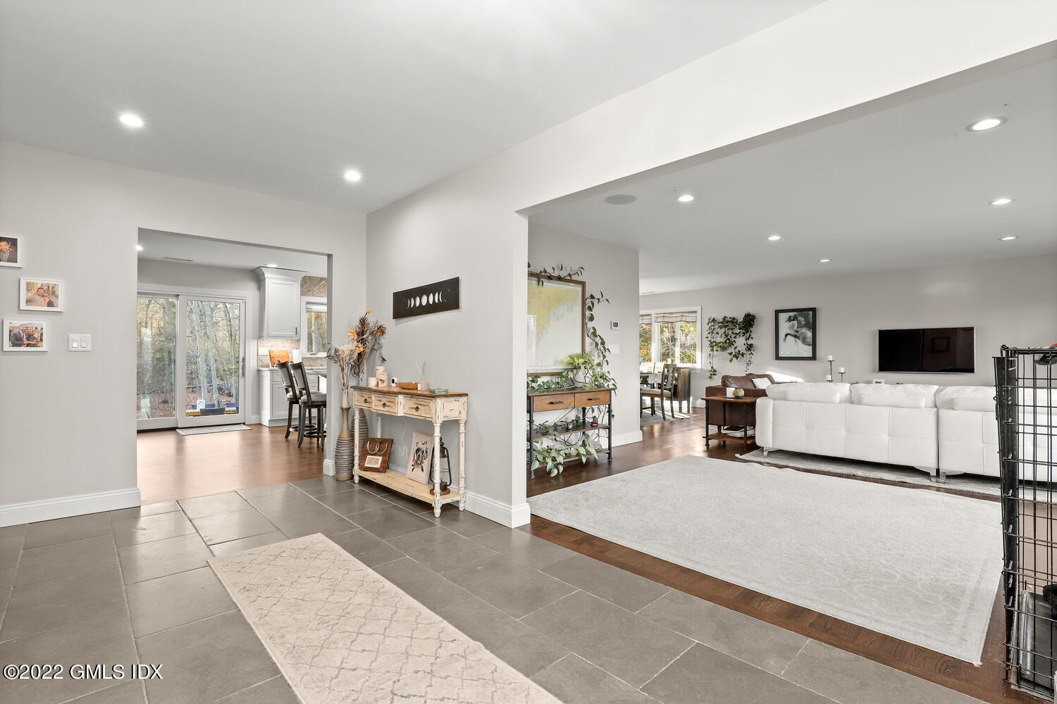 442 Riversville Road Greenwich, CT 06831 - Photo 3 of 29 a living room with furniture and a flat screen tv