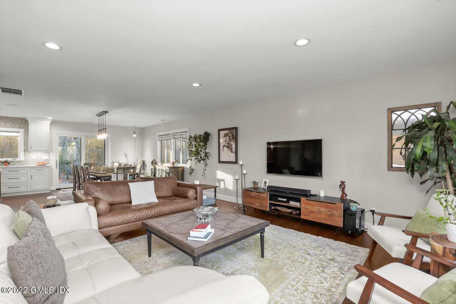 442 Riversville Road Greenwich, CT 06831 - Photo 4 of 29 a living room with furniture and a flat screen tv