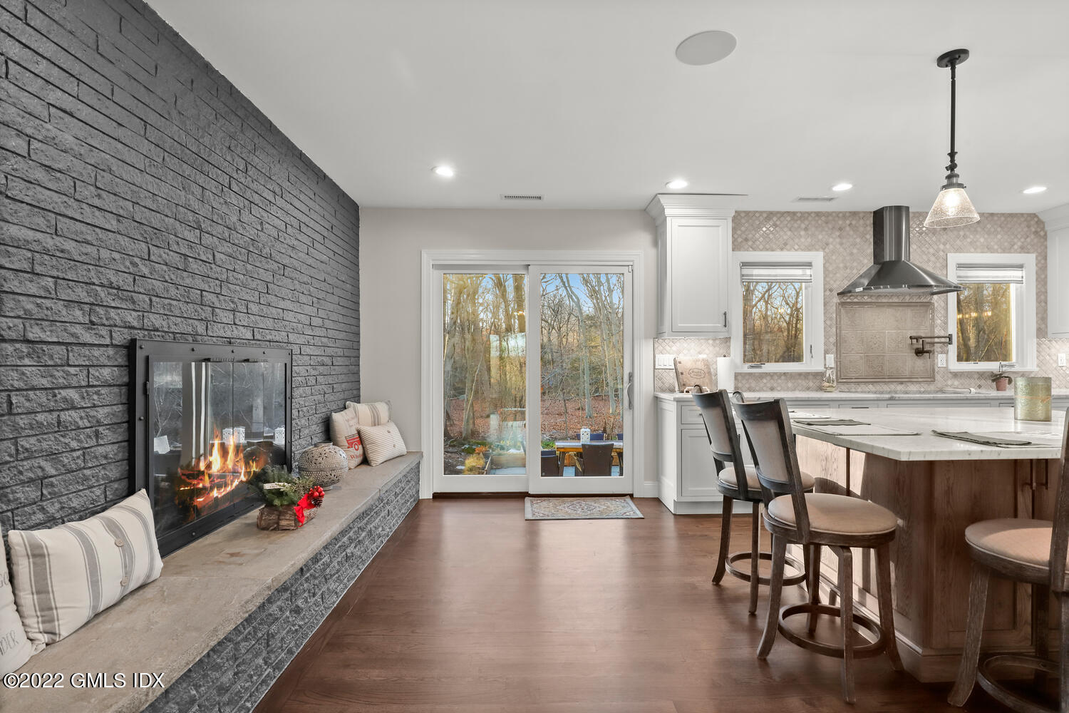 442 Riversville Road Greenwich, CT 06831 - Photo 9 of 29 a living room with furniture dining table and a large window