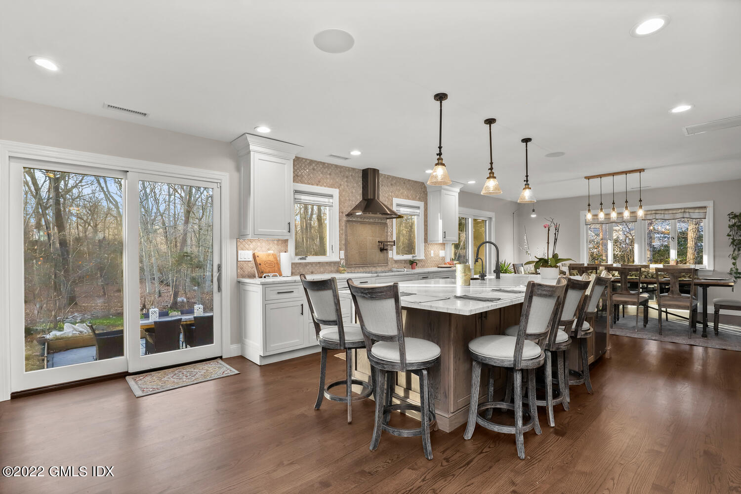 442 Riversville Road Greenwich, CT 06831 - Photo 10 of 29 a dining area with furniture window and wooden floor