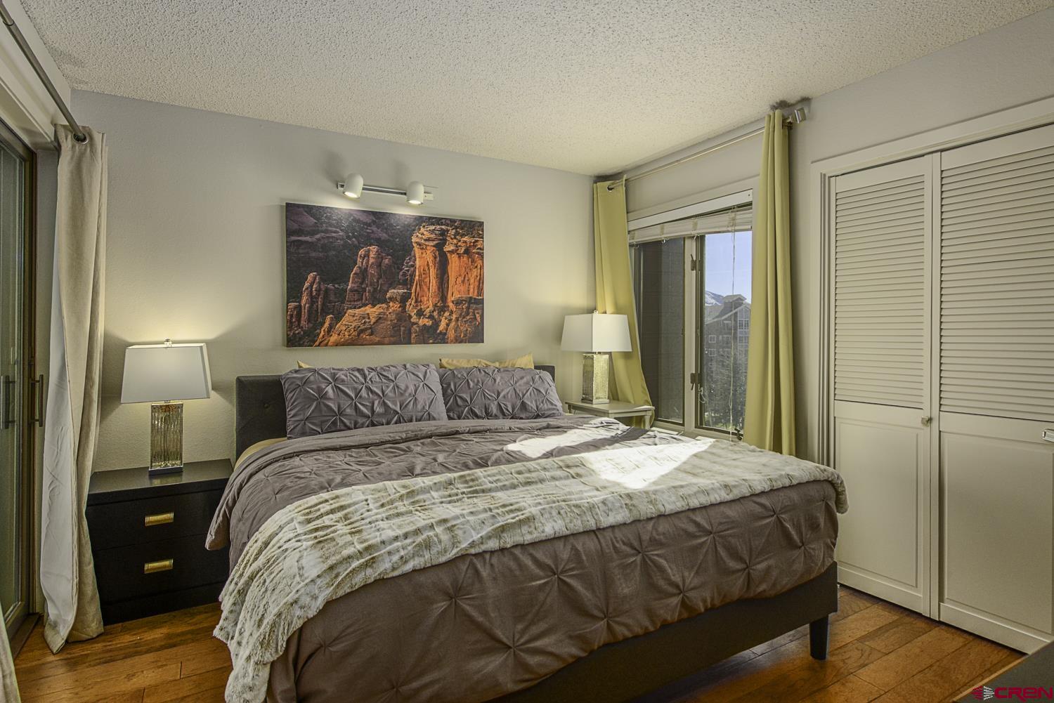 25 Emmons Road, Unit 37 Crested Butte, CO 81225 - Photo 15 of 28 a bedroom with a bed and a window