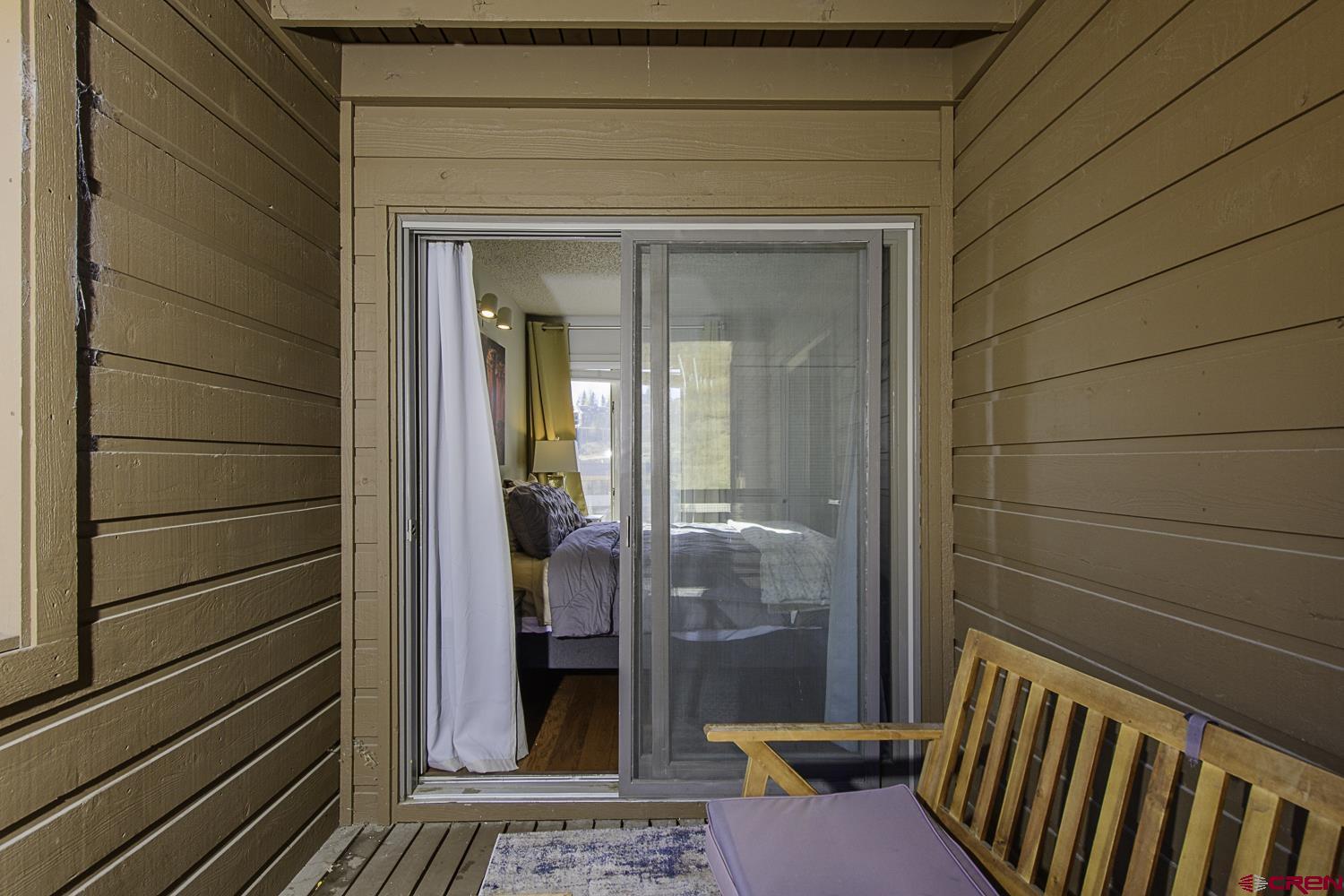25 Emmons Road, Unit 37 Crested Butte, CO 81225 - Photo 18 of 28 a view of a balcony with wooden floor