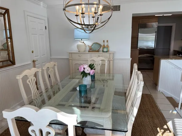 a view of dining room and livingroom with furniture wooden floor