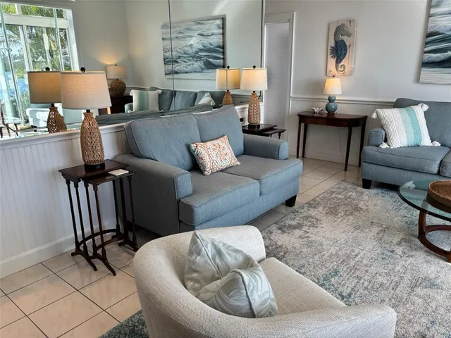 a living room with furniture and a couch