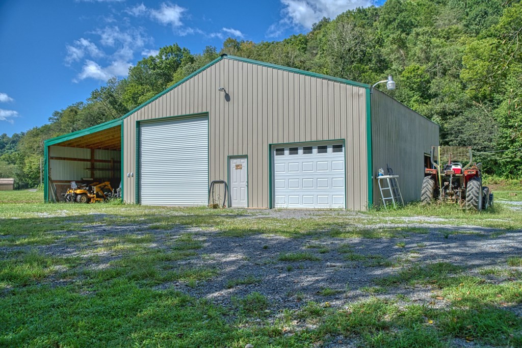1383 Morrison Creek Road Gainesboro, TN 38562 - Photo 20 of 22 a house view with a backyard space