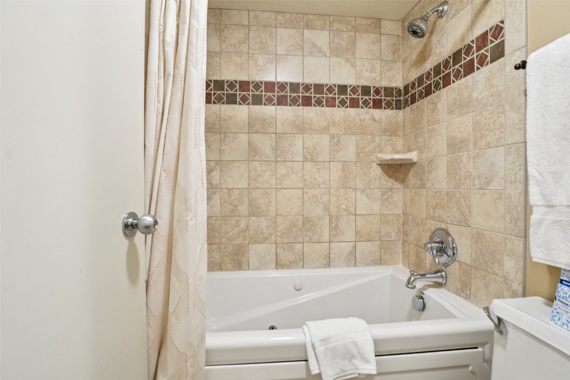 22097 Saints John Road, Unit 2506 Keystone, CO 80435 - Photo 21 of 47 Full bathroom featuring shower / bath combo with shower curtain