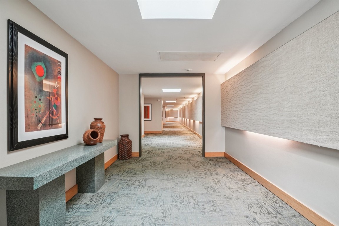 22097 Saints John Road, Unit 2506 Keystone, CO 80435 - Photo 44 of 47 Hall with baseboards and light colored carpet