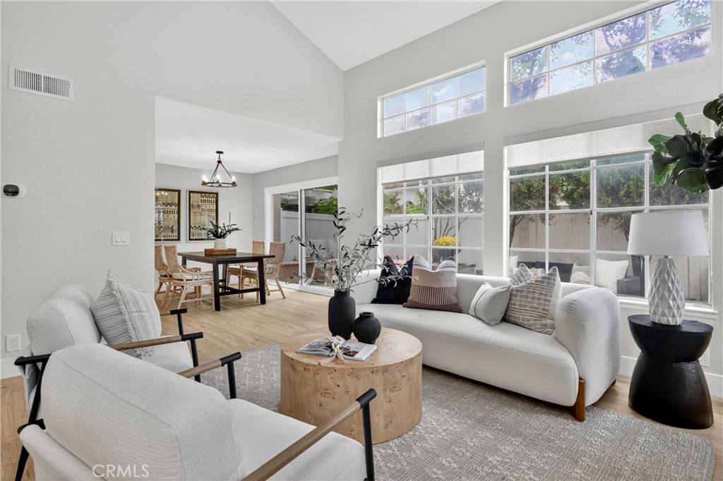29 Carnation, Unit 64 Rancho Santa Margarita, CA 92688 - Photo 5 of 38 a living room with furniture and a large window