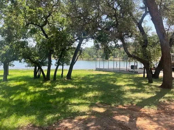 a view of swimming pool with a backyard