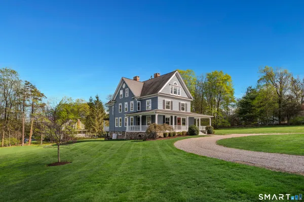 a view of a house with a big yard