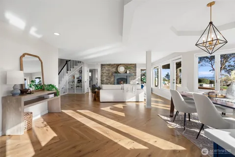 a view of a living room and dining room