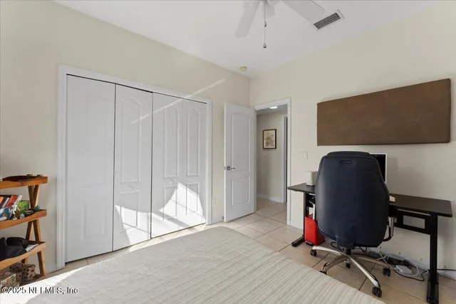 a bathroom with bathtub and window
