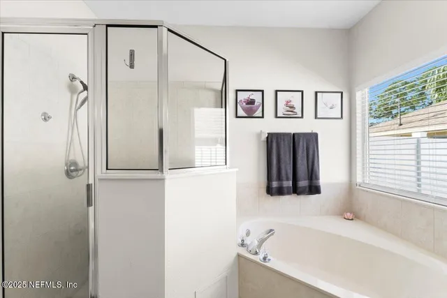 a view of a patio with couches table and chairs and potted plants