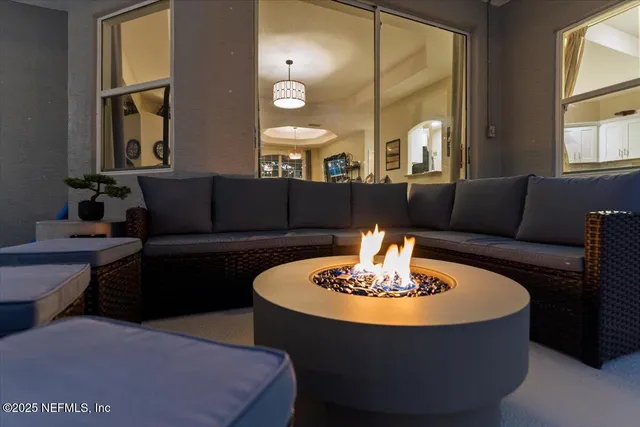 a view of a swimming pool with a patio