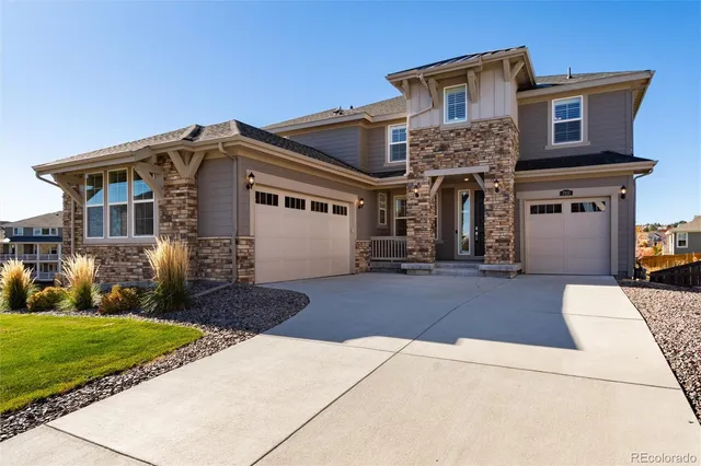 a front view of a house with yard