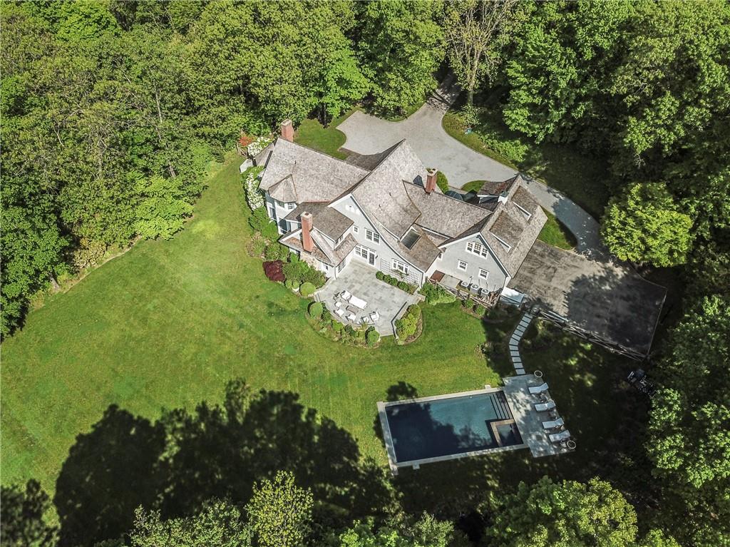 Welcome home!  284 Stone Hill Road here in Pound Ridge is ready for its next owner.  Absolutely private and lush this is really perfection.