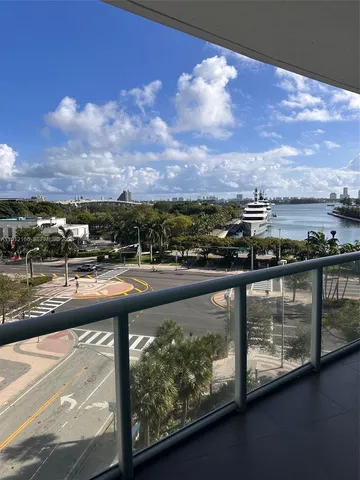 a view of swimming pool from a balcony