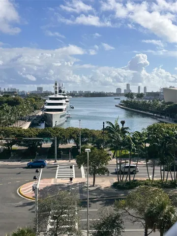 a house view with a lake view