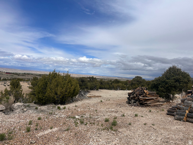 19075 West Honesty Cove Duchesne, UT 84021 - Photo 2 of 44 Expansive outdoor area featuring varied terrain with natural rock and sparse vegetation
