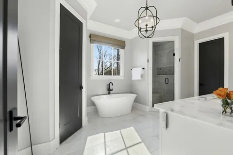 a bathroom with a sink vanity and mirror